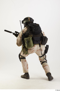 Photos Reece Bates Army Navy Seals Operator - Poses crouching…